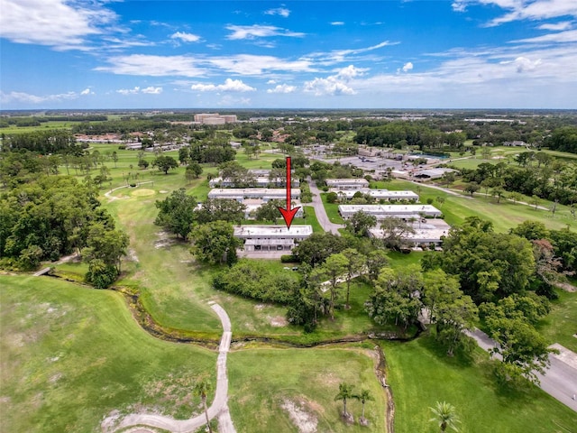 3712 Trophy Blvd Unit 3712, New Port Richey, FL 34655 - aerial view of property's location featuring a tree filled landscape and a golf course
