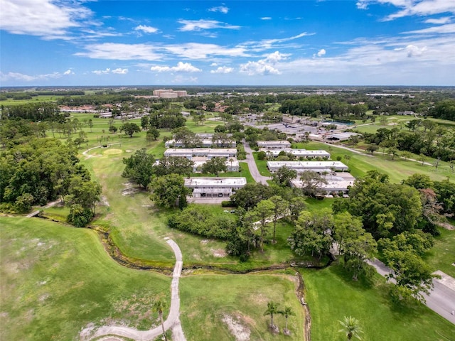 3712 Trophy Blvd Unit 3712, New Port Richey, FL 34655 - aerial overview of property's location with a local golf course and a tree filled landscape