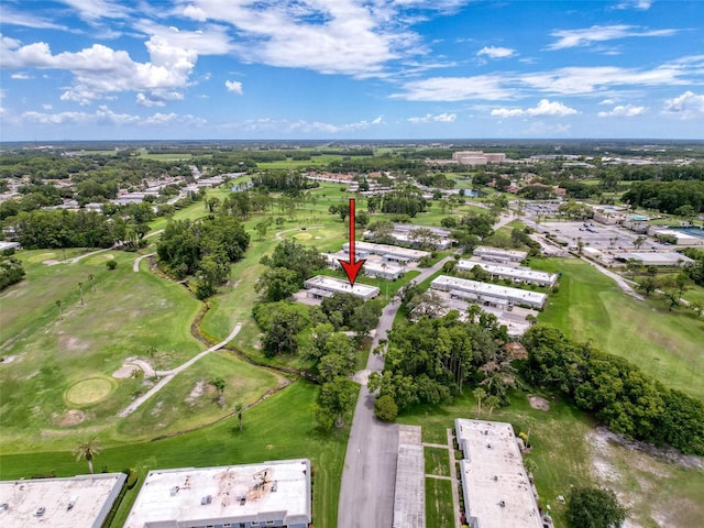 3712 Trophy Blvd Unit 3712, New Port Richey, FL 34655 - aerial view of property's location featuring a golf course and a tree filled landscape