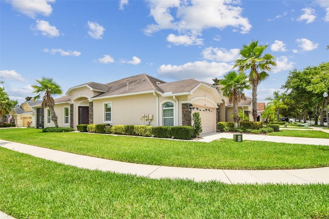 20820 Amanda Oak Ct, Land O Lakes, FL 34638 - view of front of property featuring an attached garage, stucco siding, a front yard, and driveway