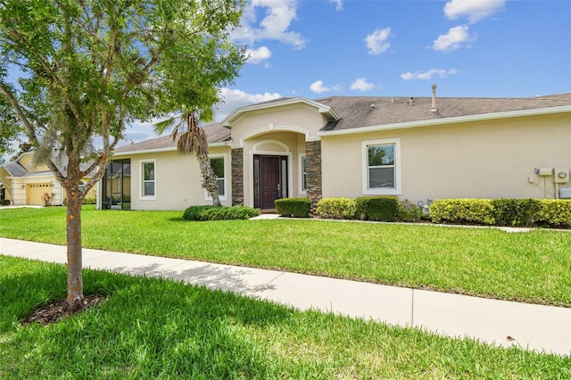 20820 Amanda Oak Ct, Land O Lakes, FL 34638 - single story home featuring stucco siding, a front lawn, stone siding, and a shingled roof