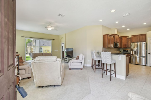 20820 Amanda Oak Ct, Land O Lakes, FL 34638 - living room with ceiling fan, recessed lighting, and light tile patterned flooring