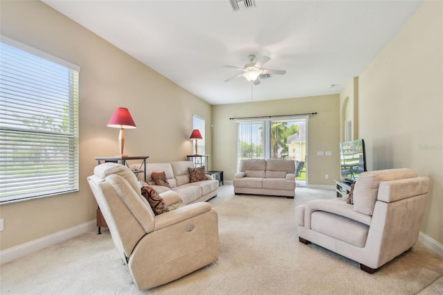 20820 Amanda Oak Ct, Land O Lakes, FL 34638 - carpeted living area with a ceiling fan and baseboards