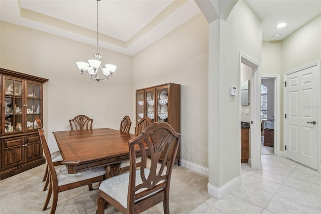 20820 Amanda Oak Ct, Land O Lakes, FL 34638 - dining area with a high ceiling, arched walkways, a chandelier, and light colored carpet