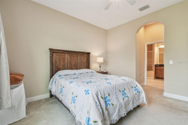 20820 Amanda Oak Ct, Land O Lakes, FL 34638 - bedroom featuring light colored carpet, arched walkways, and ceiling fan