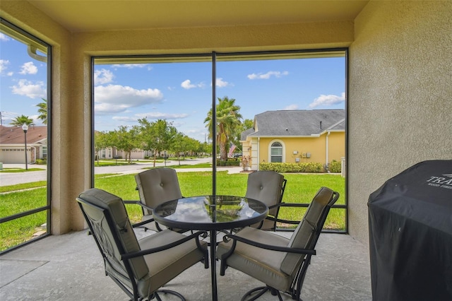 20820 Amanda Oak Ct, Land O Lakes, FL 34638 - sunroom with outdoor dining area