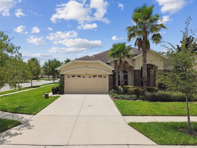 20820 Amanda Oak Ct, Land O Lakes, FL 34638 - view of front facade with an attached garage, a front lawn, stucco siding, driveway, and stone siding