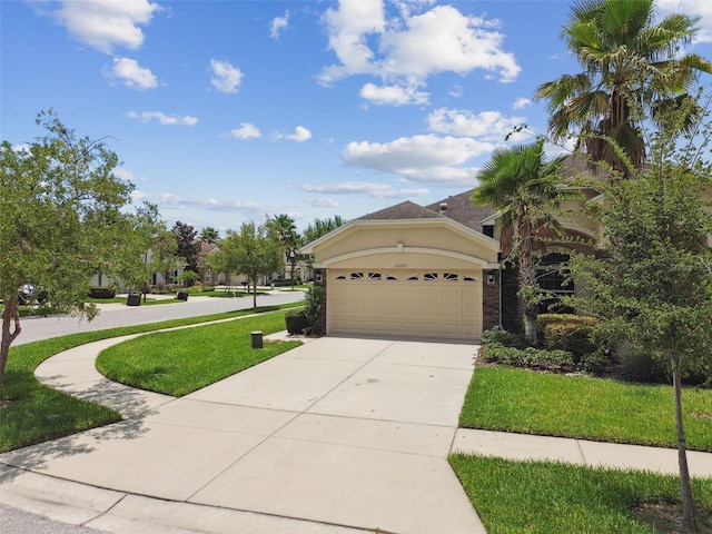 20820 Amanda Oak Ct, Land O Lakes, FL 34638 - view of front of property featuring driveway, a garage, stucco siding, and a front lawn