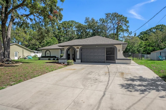 2152 Danforth Rd, Spring Hill, FL 34608 - single story home featuring stucco siding, driveway, a garage, and roof with shingles