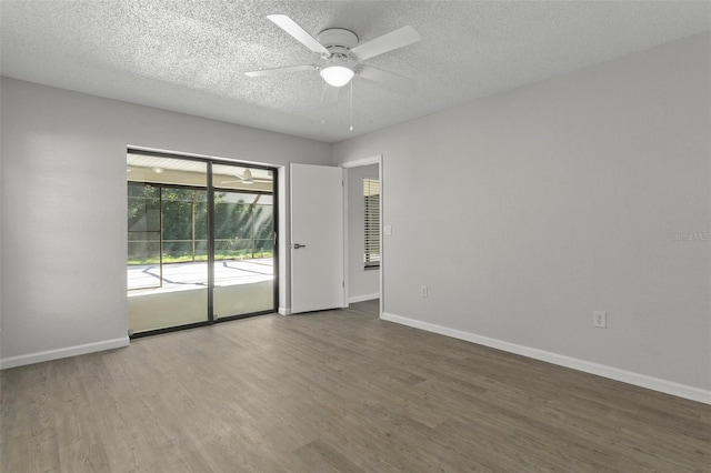 2152 Danforth Rd, Spring Hill, FL 34608 - empty room featuring ceiling fan, wood finished floors, and a textured ceiling