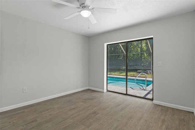 2152 Danforth Rd, Spring Hill, FL 34608 - empty room featuring wood finished floors and ceiling fan