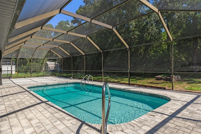 2152 Danforth Rd, Spring Hill, FL 34608 - swimming pool with a patio and glass enclosure