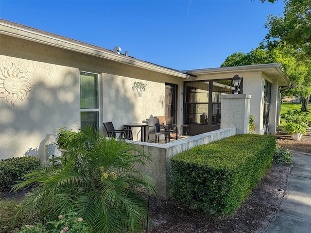 8130 Bugle Ct Unit 3, Port Richey, FL 34668 - property entrance with stucco siding