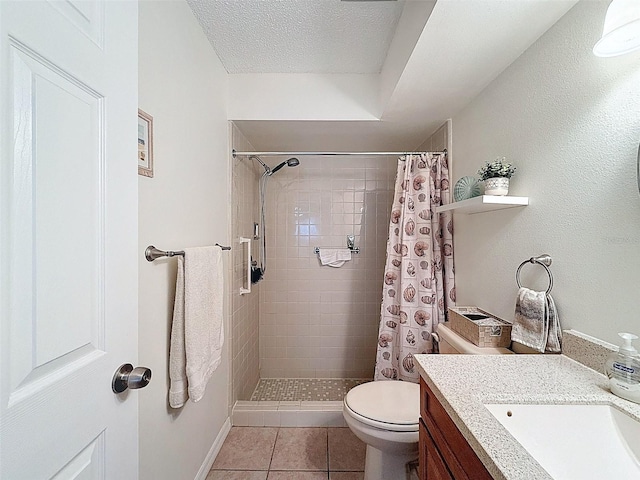 8130 Bugle Ct Unit 3, Port Richey, FL 34668 - bathroom featuring vanity, a tile shower, tile patterned floors, and a textured ceiling