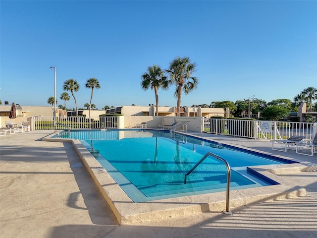 8130 Bugle Ct Unit 3, Port Richey, FL 34668 - community pool with a patio area
