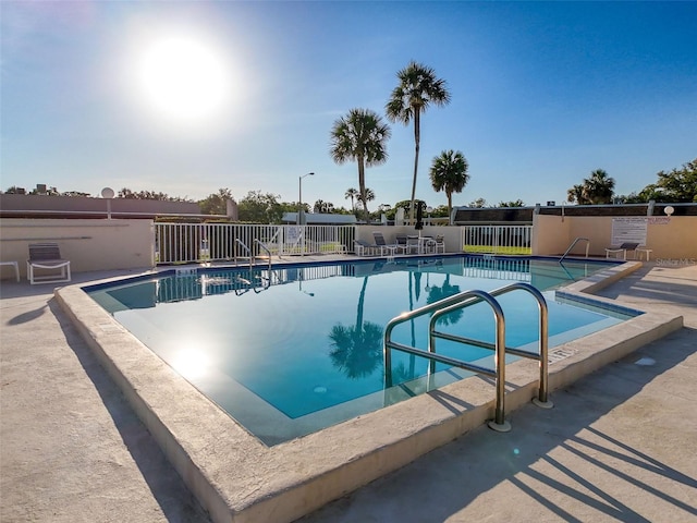 8130 Bugle Ct Unit 3, Port Richey, FL 34668 - community pool with a patio