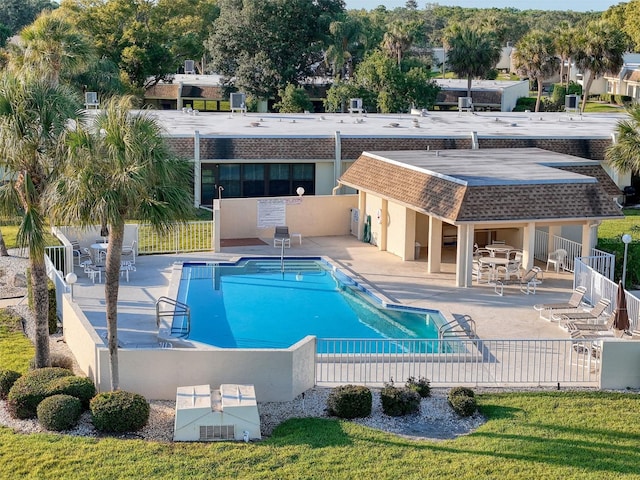 8130 Bugle Ct Unit 3, Port Richey, FL 34668 - community pool with a patio