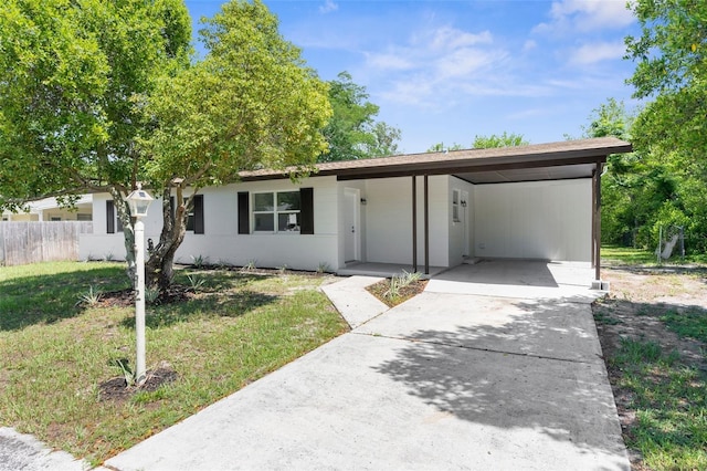 7192 Catalina St, Spring Hill, FL 34606 - view of front of home featuring concrete driveway and a carport