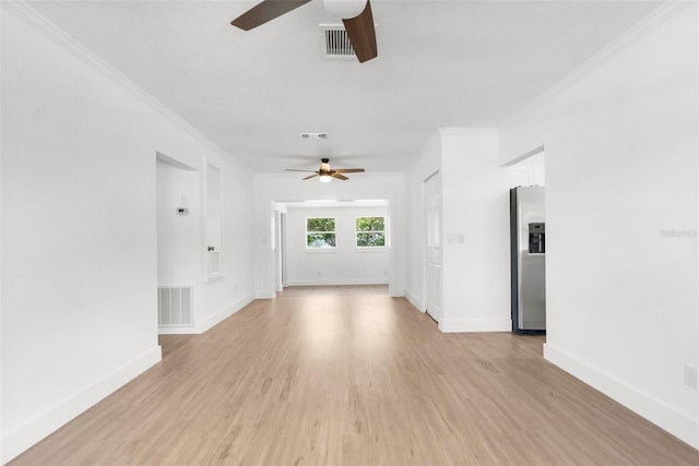 7192 Catalina St, Spring Hill, FL 34606 - unfurnished living room featuring ceiling fan, ornamental molding, and light wood-style floors