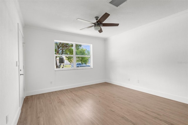 7192 Catalina St, Spring Hill, FL 34606 - unfurnished room featuring crown molding, ceiling fan, and wood finished floors