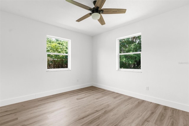 7192 Catalina St, Spring Hill, FL 34606 - empty room with light wood-style floors and a ceiling fan