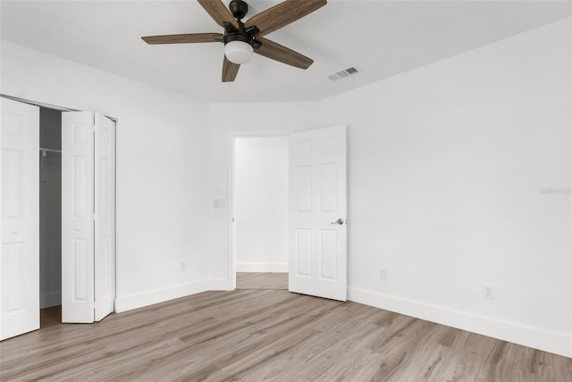 7192 Catalina St, Spring Hill, FL 34606 - unfurnished bedroom featuring light wood-type flooring, a closet, and ceiling fan