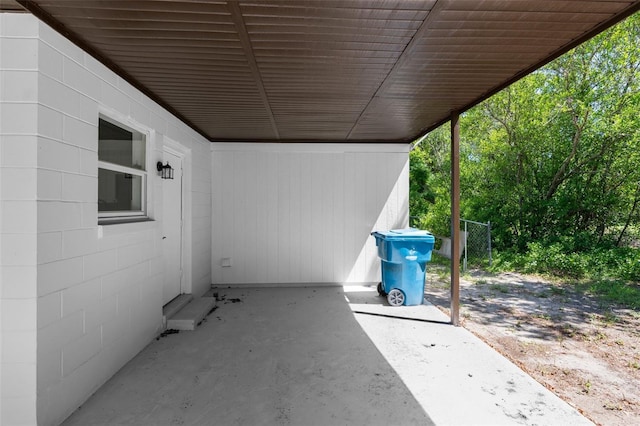 7192 Catalina St, Spring Hill, FL 34606 - view of patio / terrace featuring an attached carport