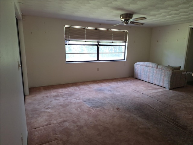 4420 Sawgrass Blvd, New Port Richey, FL 34653 - empty room with a ceiling fan and carpet floors