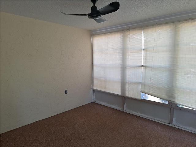 4420 Sawgrass Blvd, New Port Richey, FL 34653 - carpeted empty room with a ceiling fan, a textured wall, and a textured ceiling
