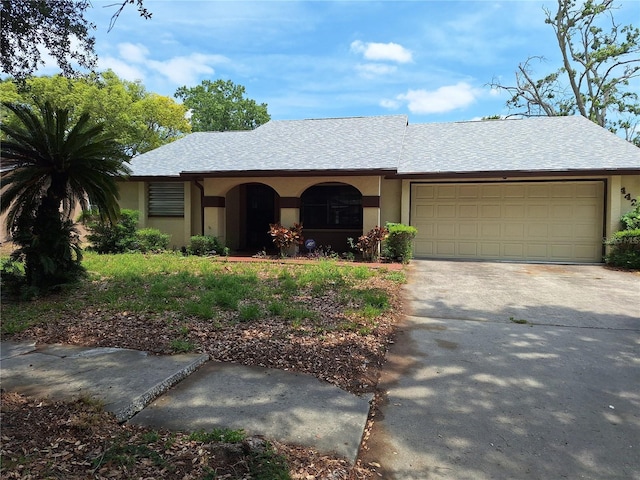4420 Sawgrass Blvd, New Port Richey, FL 34653 - ranch-style home featuring an attached garage, concrete driveway, and stucco siding