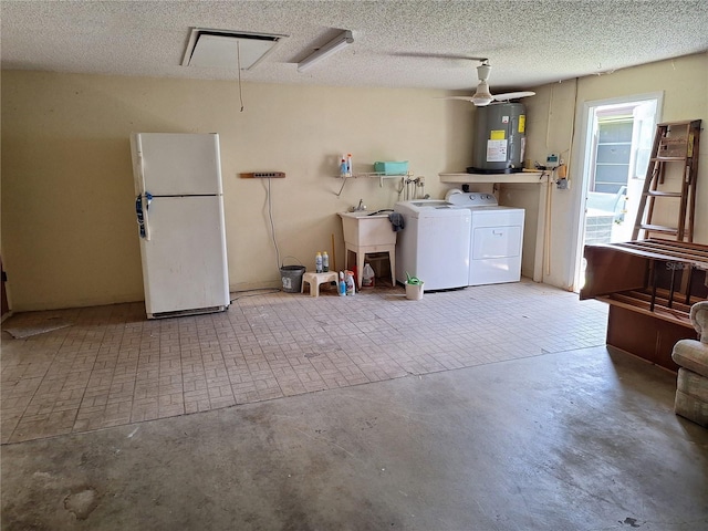4420 Sawgrass Blvd, New Port Richey, FL 34653 - garage featuring freestanding refrigerator, electric water heater, washing machine and clothes dryer, and ceiling fan