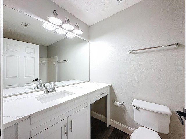 10124 Heathcliff St, Spring Hill, FL 34608 - bathroom featuring vanity and wood finished floors