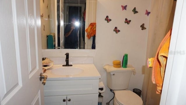 5434 Chad Pl Unit 14, New Port Richey, FL 34652 - half bath with vanity and toilet