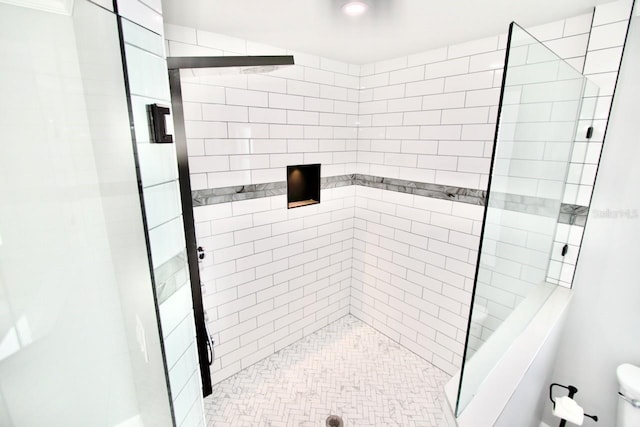 5339 Bowline Bnd, New Port Richey, FL 34652 - bathroom featuring a stall shower and toilet