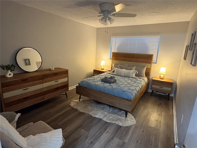5555 Gulf Blvd Unit 315, St Pete Beach, FL 33706 - bedroom featuring wood finished floors, a textured ceiling, and a ceiling fan