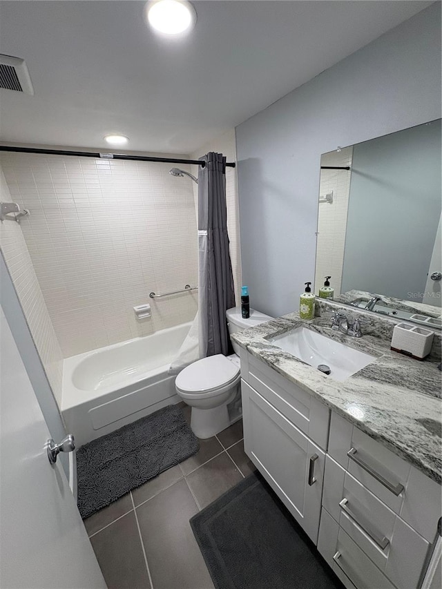 5555 Gulf Blvd Unit 315, St Pete Beach, FL 33706 - bathroom featuring shower / bathtub combination with curtain, vanity, and tile patterned floors