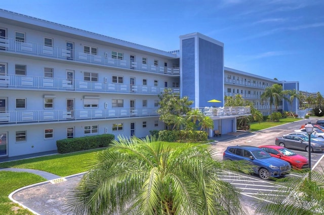 5555 Gulf Blvd Unit 315, St Pete Beach, FL 33706 - view of apartment building / complex with uncovered parking