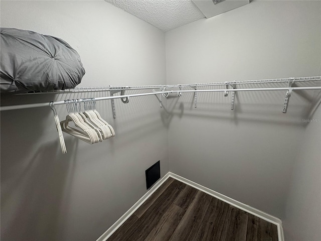 5555 Gulf Blvd Unit 315, St Pete Beach, FL 33706 - spacious closet with dark wood-style floors