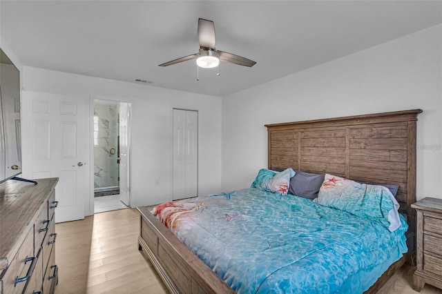 15950 Adobe Dr, Hudson, FL 34667 - bedroom featuring light wood-style flooring, ceiling fan, and connected bathroom