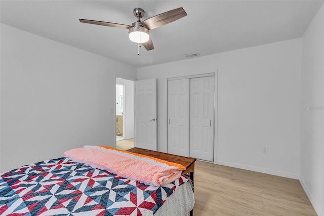 15950 Adobe Dr, Hudson, FL 34667 - bedroom featuring light wood-type flooring, a ceiling fan, and a closet