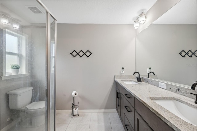 11034 Flock Ave, Weeki Wachee, FL 34613 - full bath featuring double vanity, tile patterned floors, and a shower with shower door