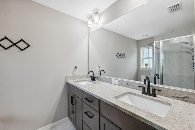 11034 Flock Ave, Weeki Wachee, FL 34613 - full bathroom featuring double vanity, a stall shower, and tile patterned flooring
