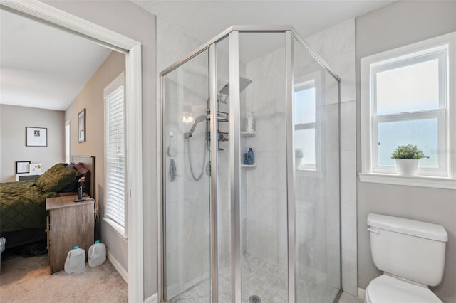 11034 Flock Ave, Weeki Wachee, FL 34613 - full bathroom with healthy amount of natural light, connected bathroom, and a stall shower