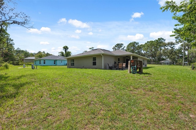 11034 Flock Ave, Weeki Wachee, FL 34613 - view of grassy yard