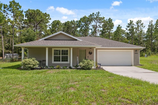 11034 Flock Ave, Weeki Wachee, FL 34613 - view of front of property featuring stucco siding, a garage, concrete driveway, and a front lawn