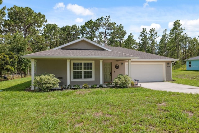 11034 Flock Ave, Weeki Wachee, FL 34613 - view of front of house with stucco siding, an attached garage, driveway, and a front yard