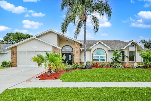 ranch-style house featuring driveway, brick siding, stucco siding, and a garage