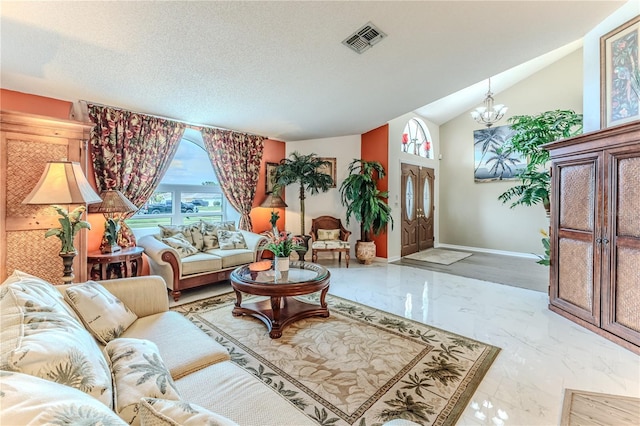 living room featuring marble tiled floors, a chandelier, and vaulted ceiling