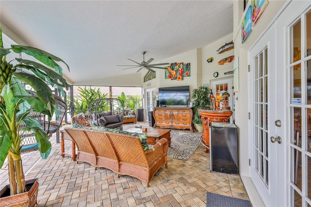 sunroom with french doors and vaulted ceiling