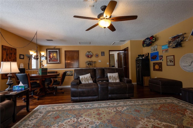 7550 Jomel Dr, Weeki Wachee, FL 34607 - living room with wood finished floors, a textured ceiling, and ceiling fan